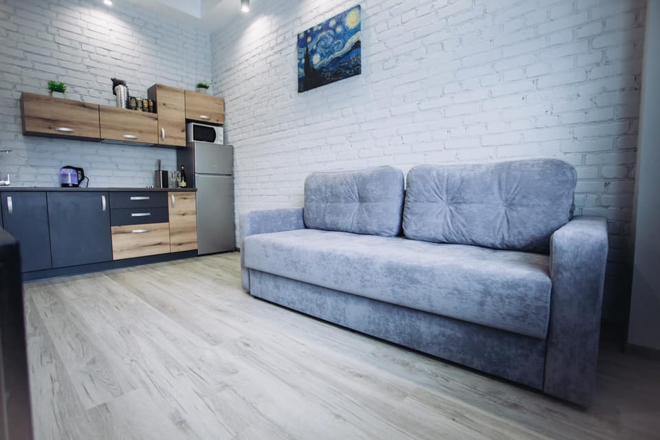 Kitchen or kitchenette, Living room, Seating area, Dining area
