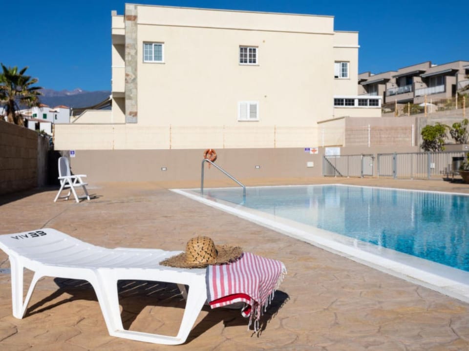 Property building, Living room, Swimming pool