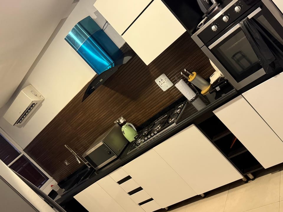 Kitchen or kitchenette, dishwasher, oven, stove