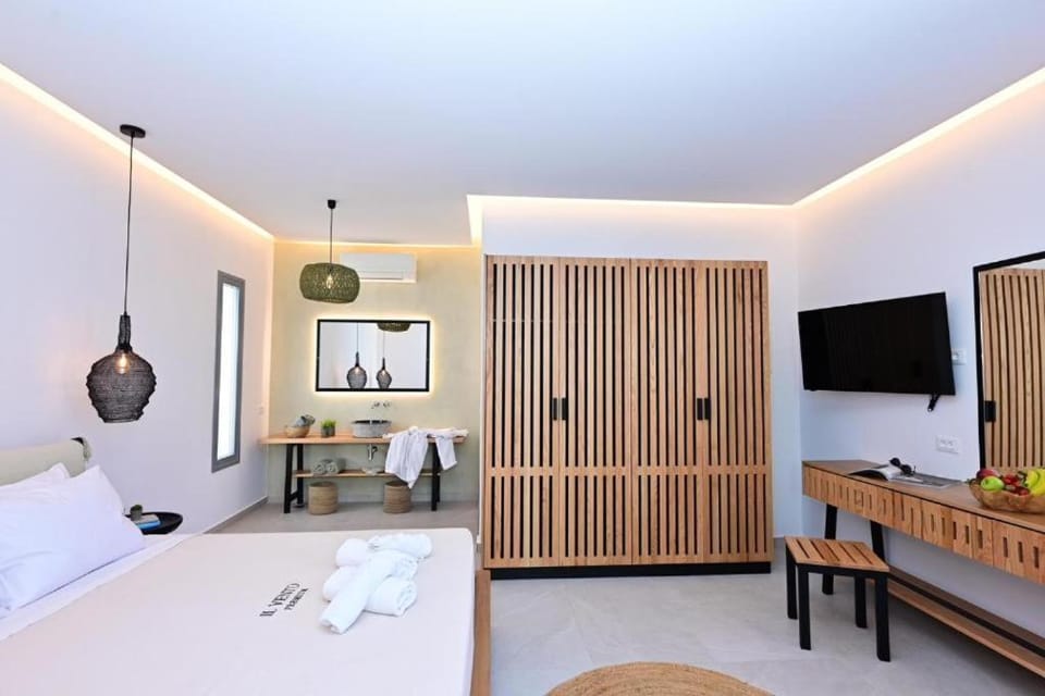 Bed, Seating area, Bedroom, towels, wardrobe