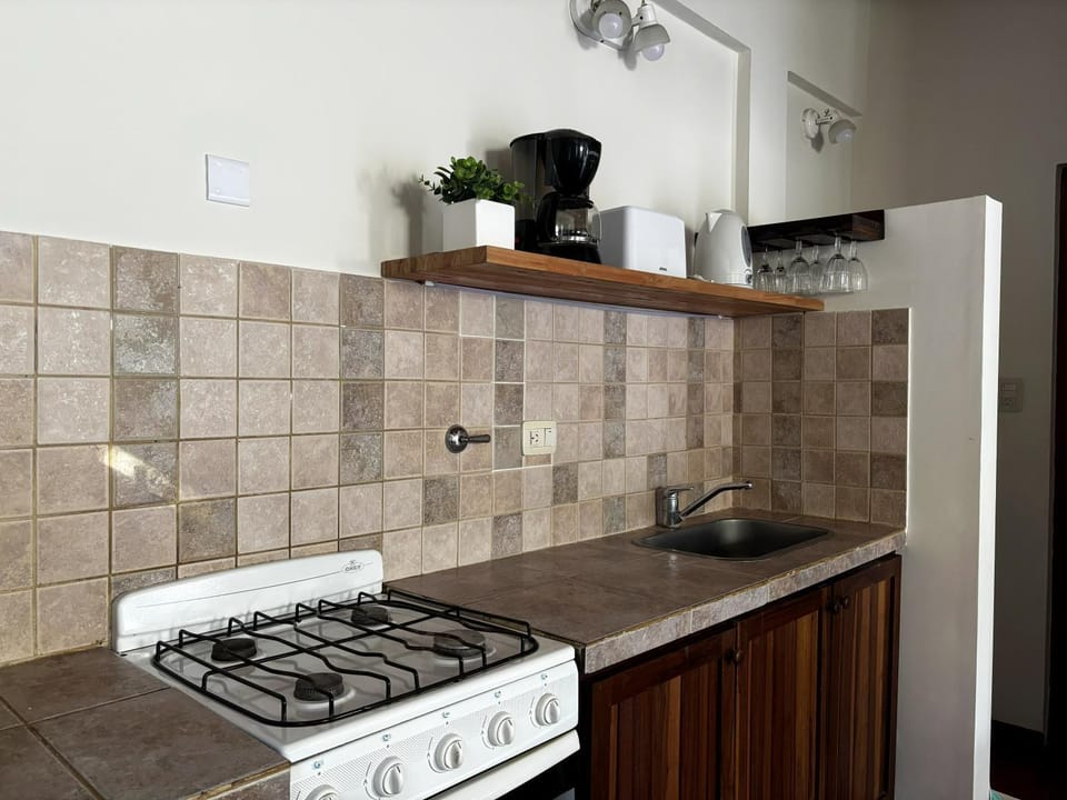 Kitchen or kitchenette, stove