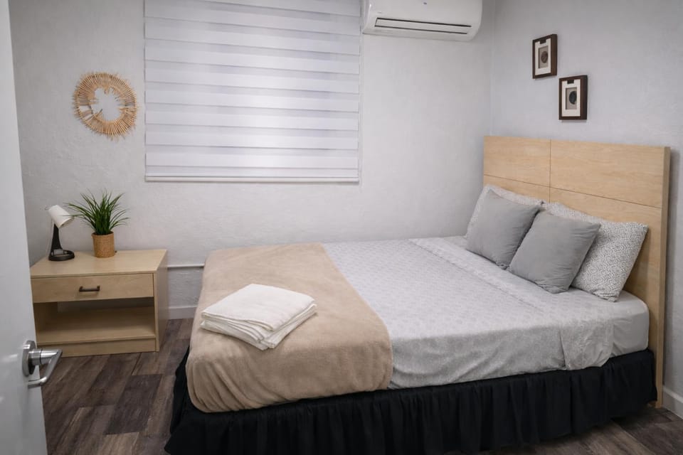 Bed, Photo of the whole room, Bedroom, towels, air conditioner
