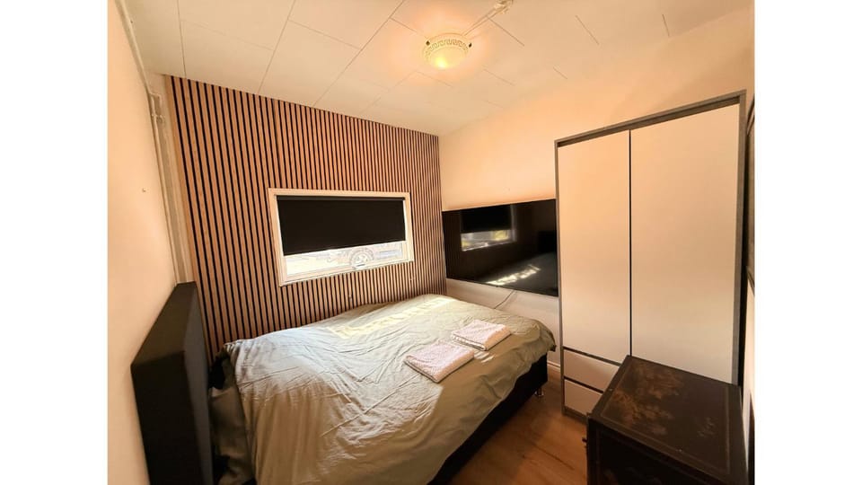 Bed, TV and multimedia, Bedroom, towels, wardrobe