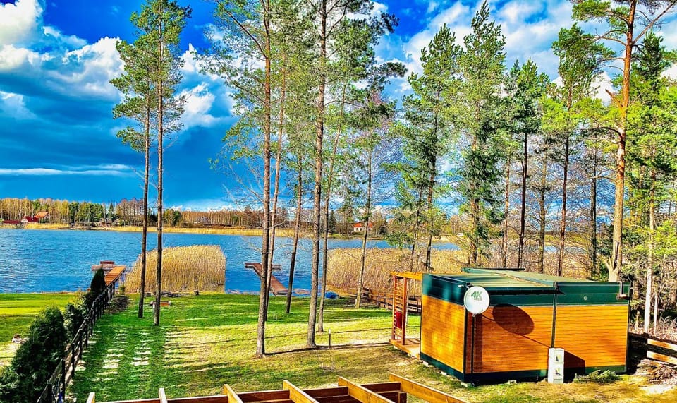 Makosieje Resort-20m od brzegu,prywatna plaża,wi-fi ,widok na jezioro Nature lodge in Poland