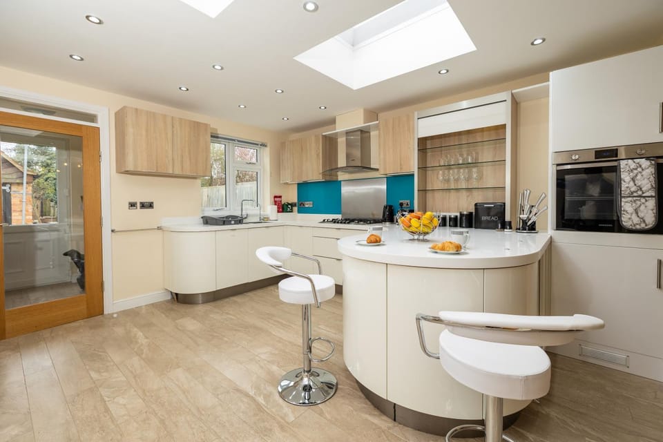 Kitchen or kitchenette, dishwasher, stove, toaster