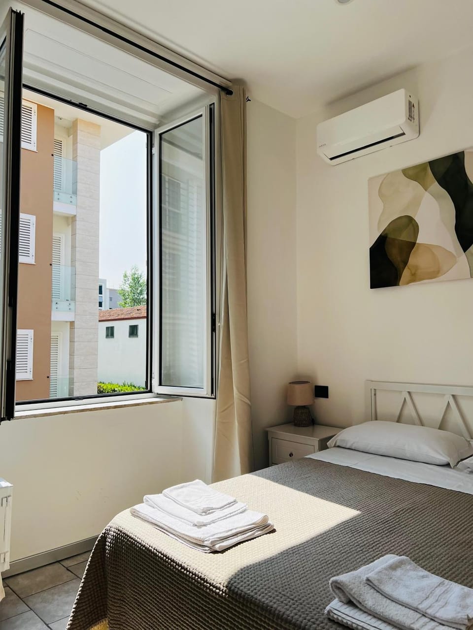 Bed, Photo of the whole room, Bedroom, towels, air conditioner