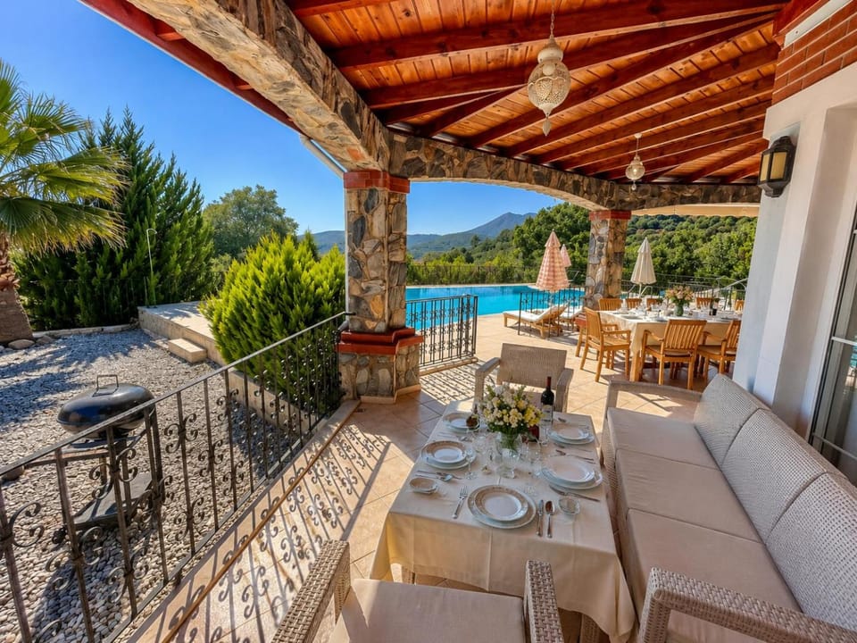 Property building, Patio, Day, Natural landscape, View (from property/room), Balcony/Terrace, Seating area, Dining area, Mountain view, Pool view, Swimming pool, sunbed