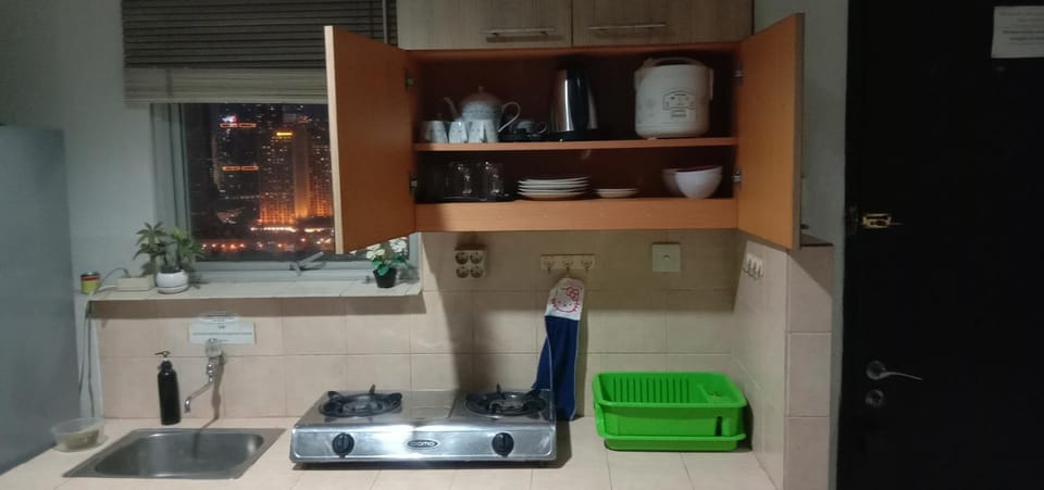 Kitchen or kitchenette, stove