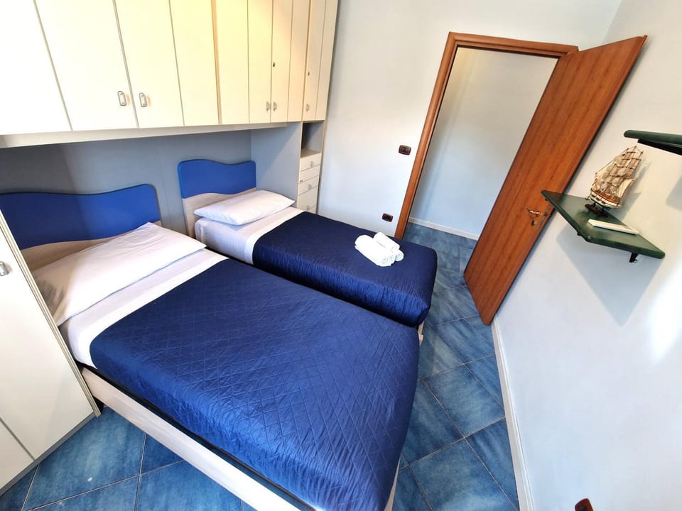Bed, Photo of the whole room, Bedroom, towels, wardrobe