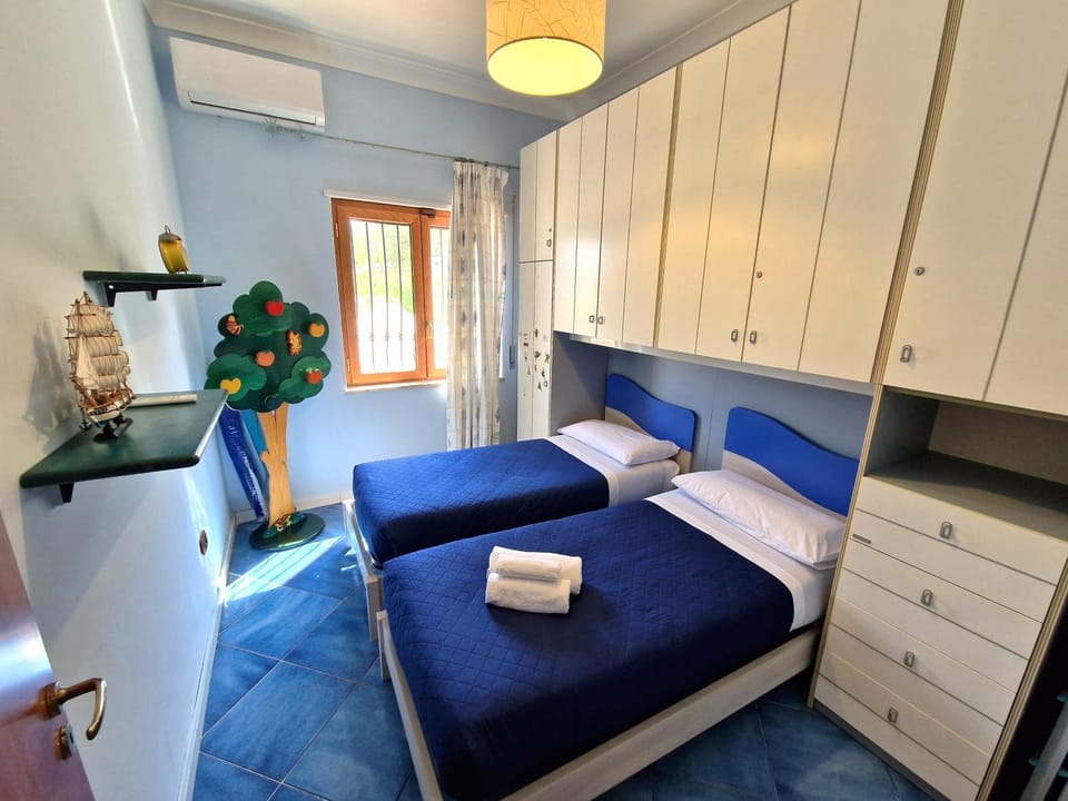 Bed, Photo of the whole room, Bedroom, towels, wardrobe, air conditioner
