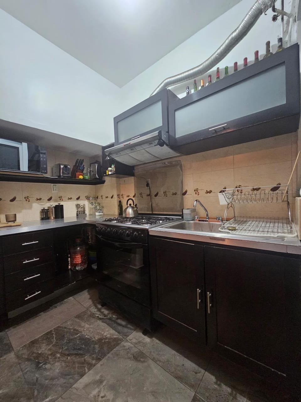 Kitchen or kitchenette, oven