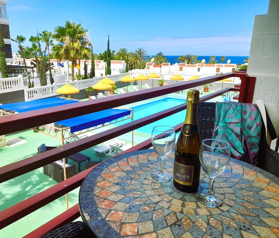 View (from property/room), Balcony/Terrace, Pool view, Sea view, Swimming pool