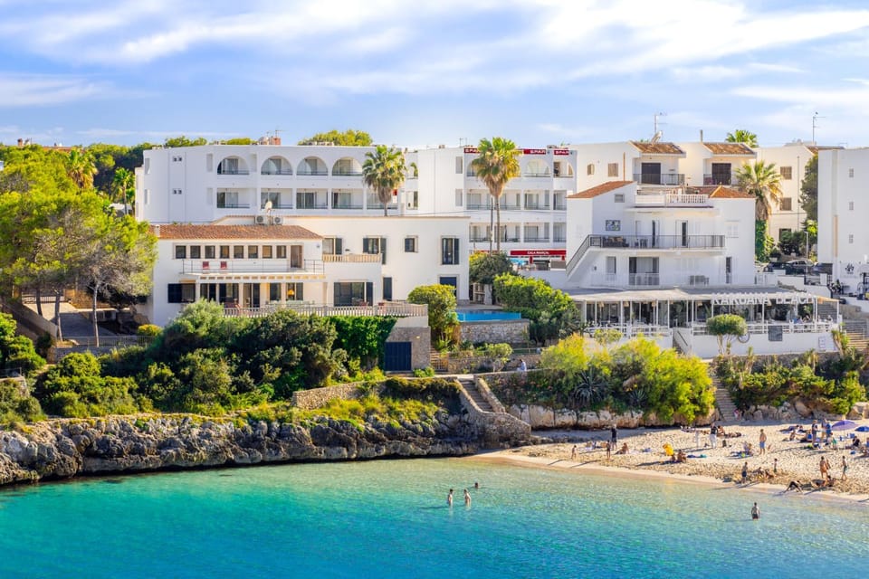 Property building, Nearby landmark, Day, Natural landscape, Beach, Sea view