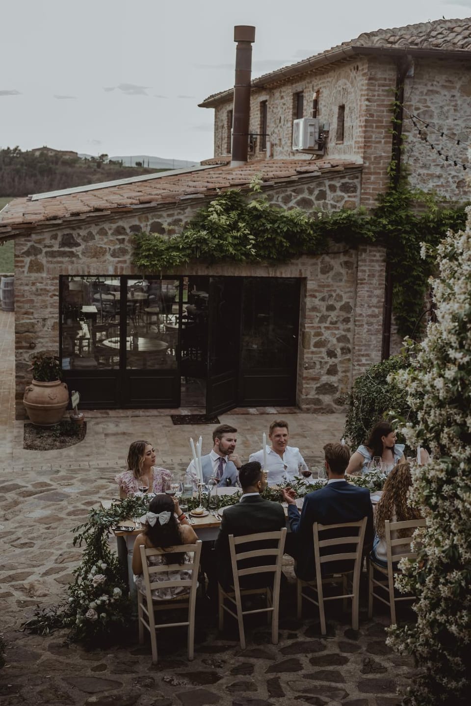 Property building, group of guests, wedding