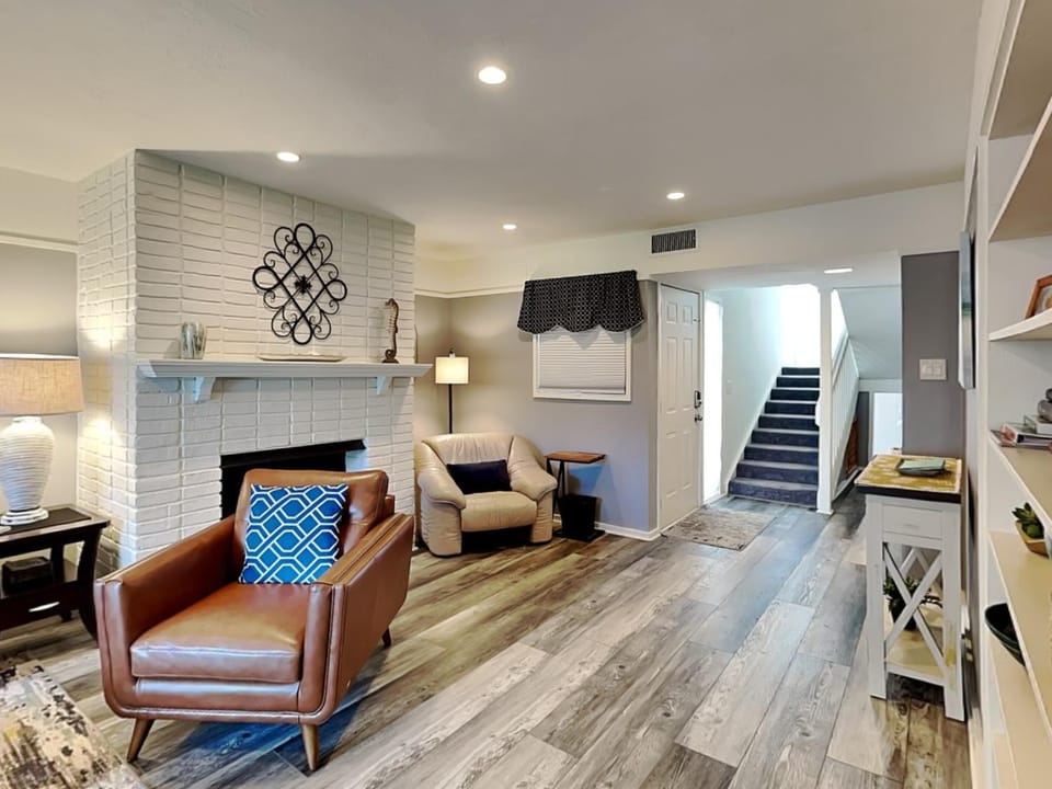 Living room, Seating area, fireplace, furniture, air conditioner