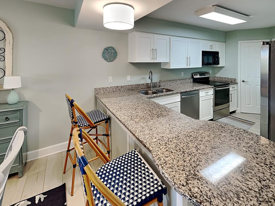 Kitchen or kitchenette, microwave, oven, stove, kitchen