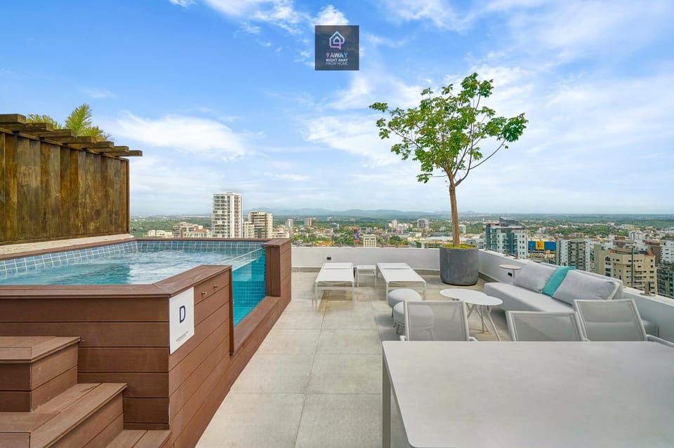 View (from property/room), Seating area, City view, Swimming pool, sunbed