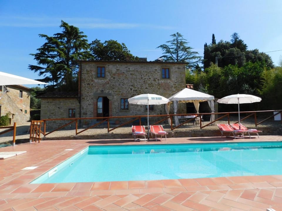 Property building, Patio, Pool view, Swimming pool, sunbed