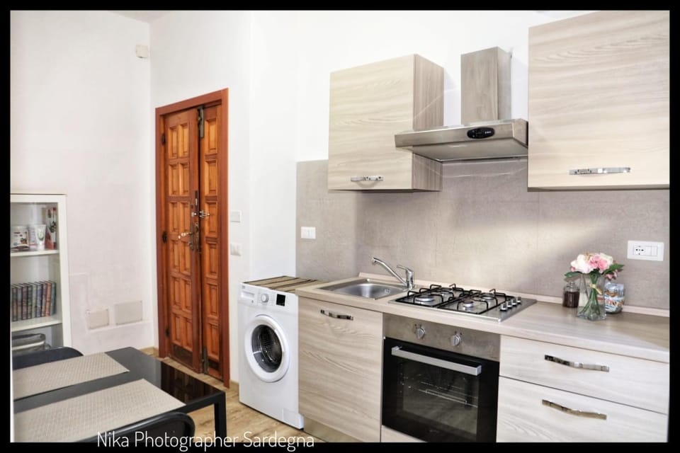 Kitchen or kitchenette, stove, washing machine, kitchen