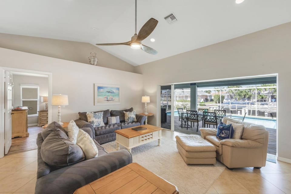 Peaceful Waterfront home with pool and steps to beach House in Marco Island