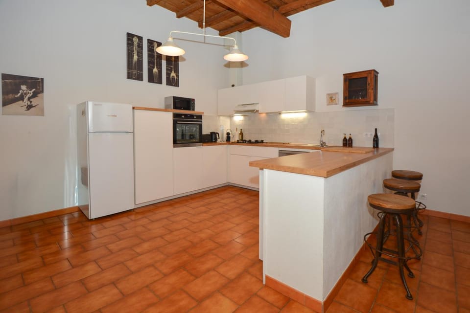 Kitchen or kitchenette, dishwasher, microwave, oven, stove, kitchen