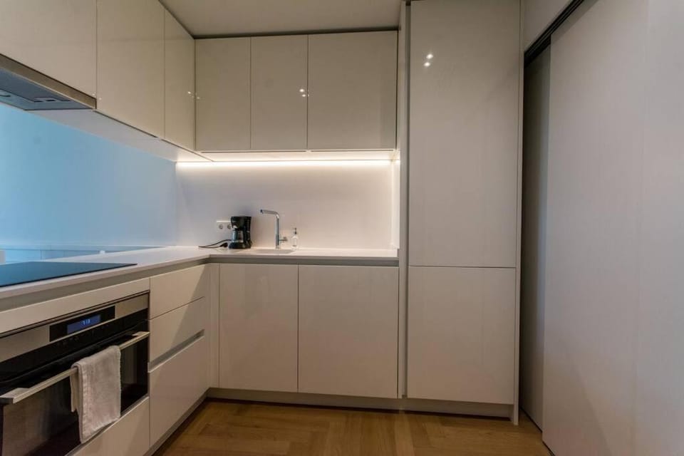 Kitchen or kitchenette, oven, stove