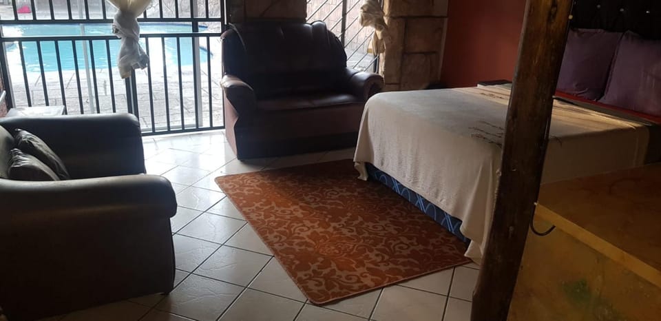 Bed, Living room, Photo of the whole room, Seating area, Bedroom