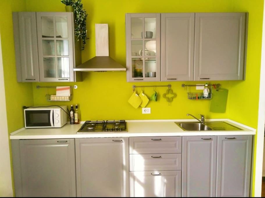 Kitchen or kitchenette, oven, stove