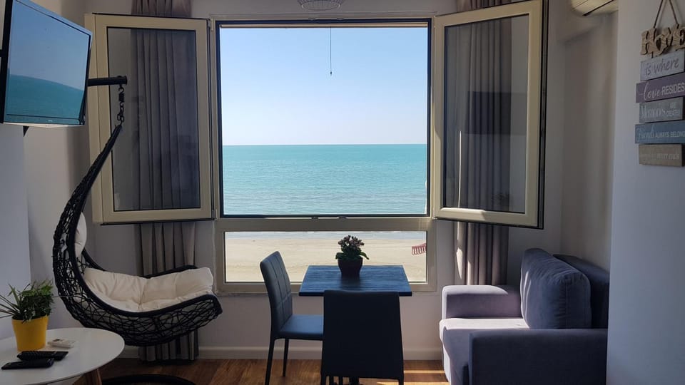 Living room, Seating area, Beach, Sea view