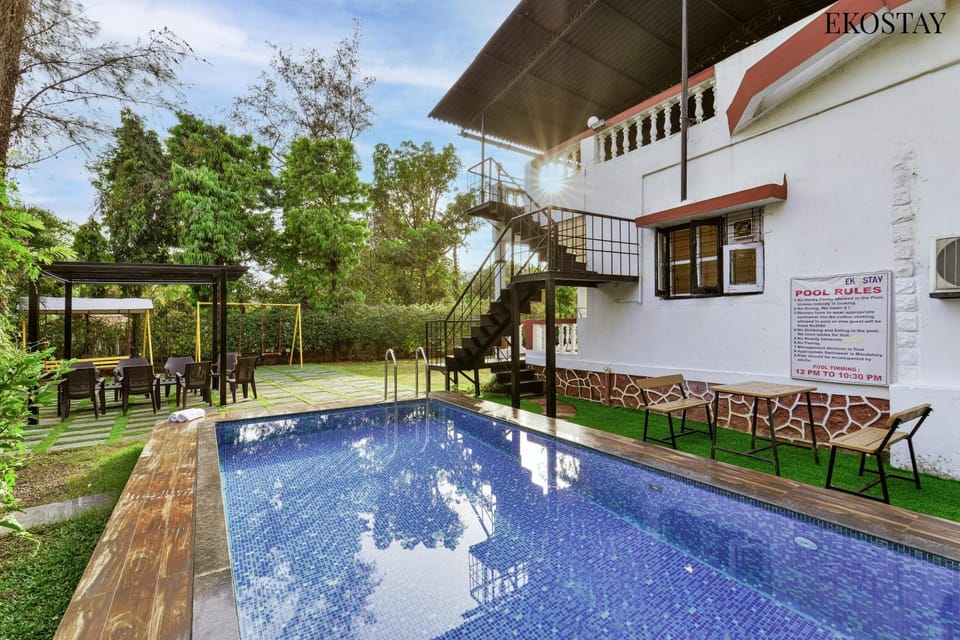Property building, Patio, Day, Garden, View (from property/room), Garden view, Pool view, Swimming pool, sunbed