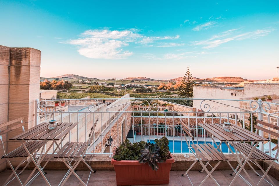 View (from property/room), Balcony/Terrace, Mountain view, Pool view, Swimming pool, Sunset, Inner courtyard view