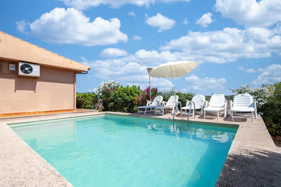 Property building, Living room, Swimming pool