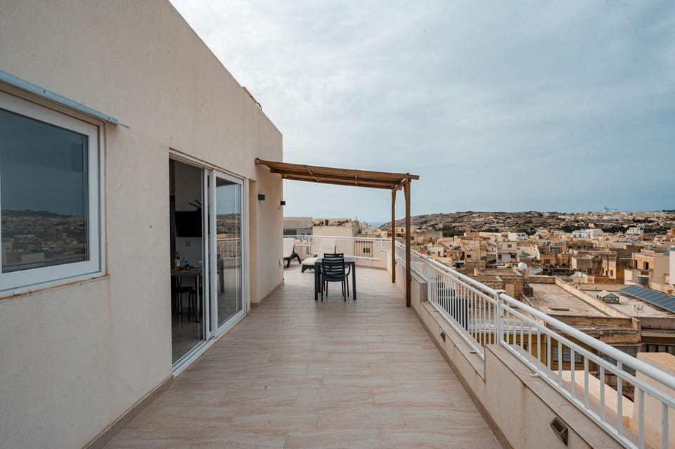Property building, Patio, Day, Natural landscape, View (from property/room), Balcony/Terrace, Dining area, City view, Sea view