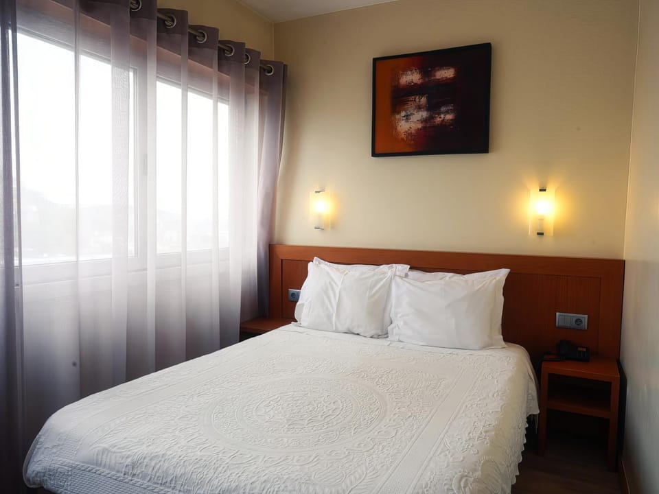 Bed, City view