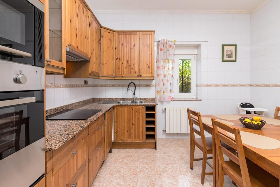 Kitchen or kitchenette, dishwasher, oven, stove