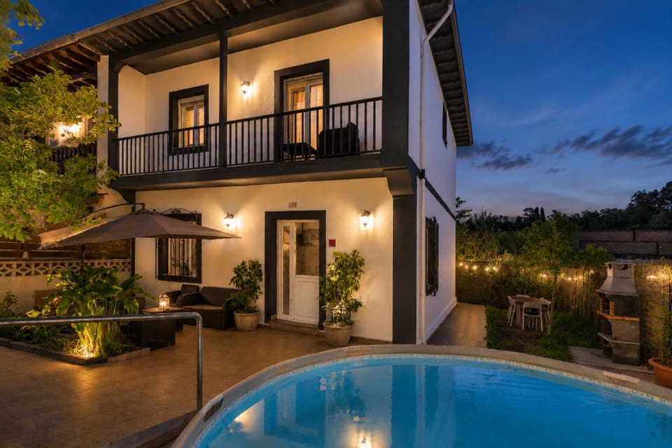 Property building, Patio, Night, Garden, View (from property/room), Balcony/Terrace, Pool view, Swimming pool