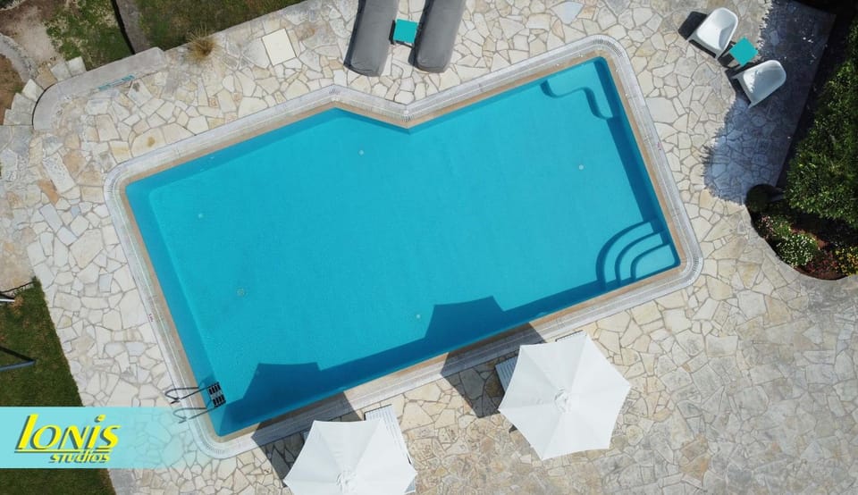 Swimming pool, sunbed