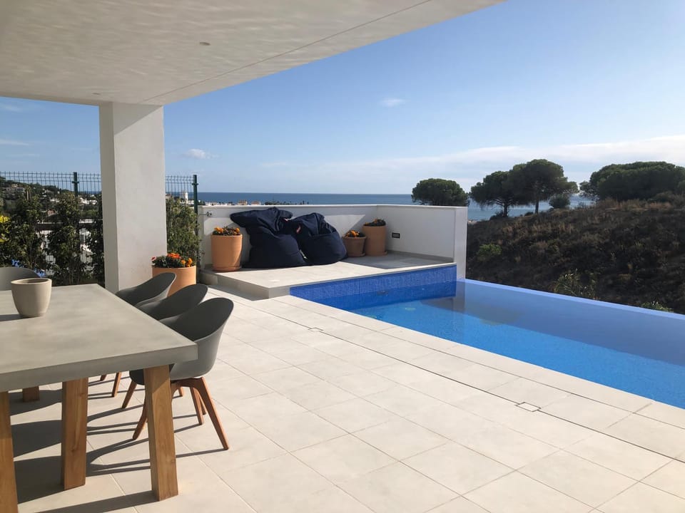 Dining area, Beach, Sea view, Swimming pool