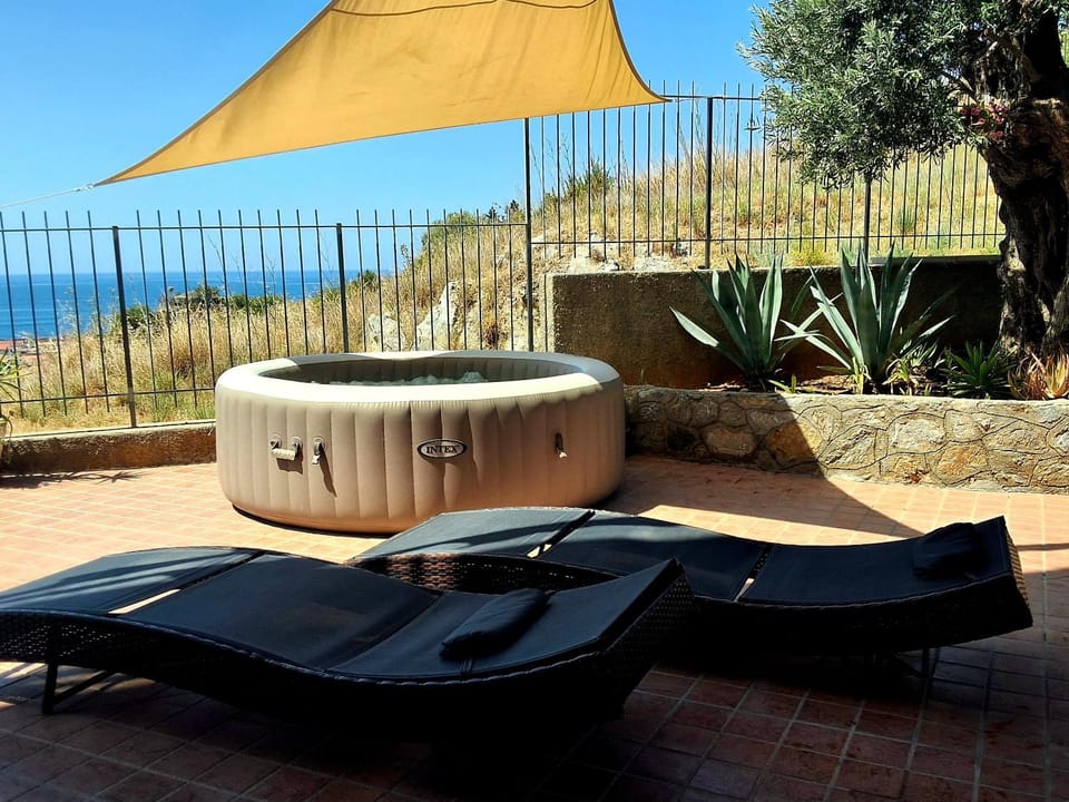 Patio, Natural landscape, Hot Tub, Spa and wellness centre/facilities, Sea view, Open Air Bath, sunbed