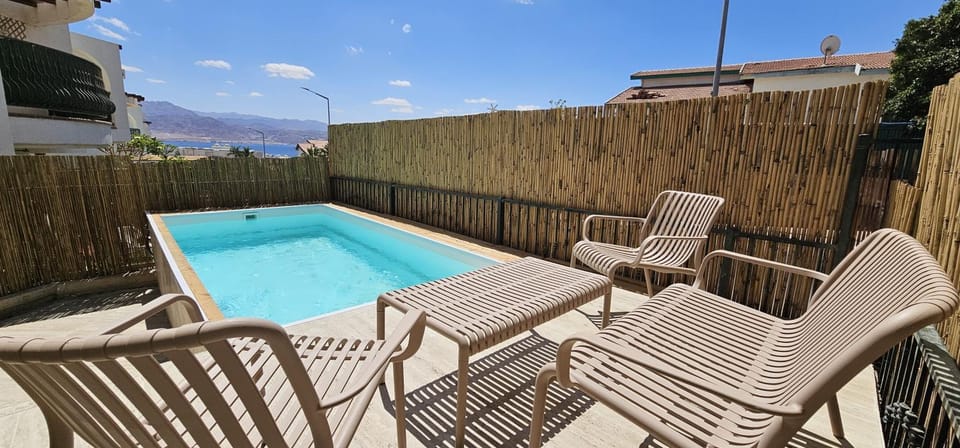 View (from property/room), Mountain view, Pool view, Swimming pool