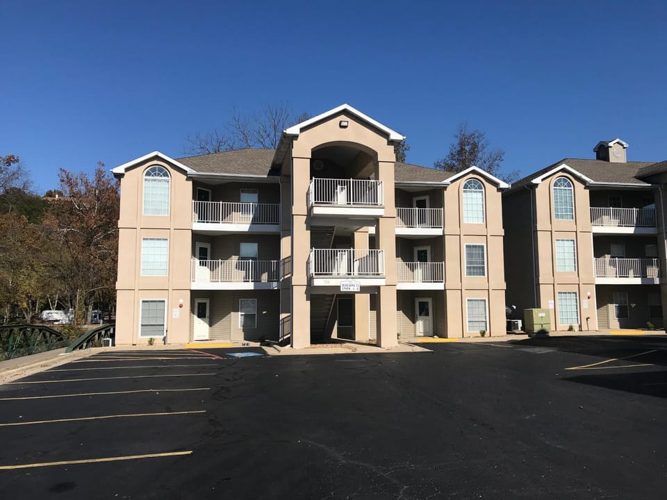 Property building, Facade/entrance, Day, Parking