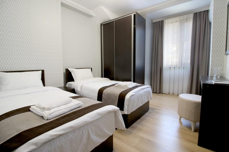 Bed, Photo of the whole room, towels, wardrobe