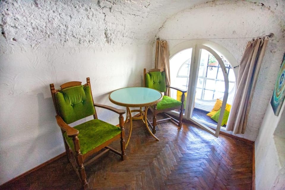 ARTrooms -round windows Rynok Sq Bed and Breakfast in Lviv
