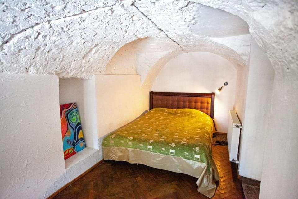 ARTrooms -round windows Rynok Sq Bed and Breakfast in Lviv
