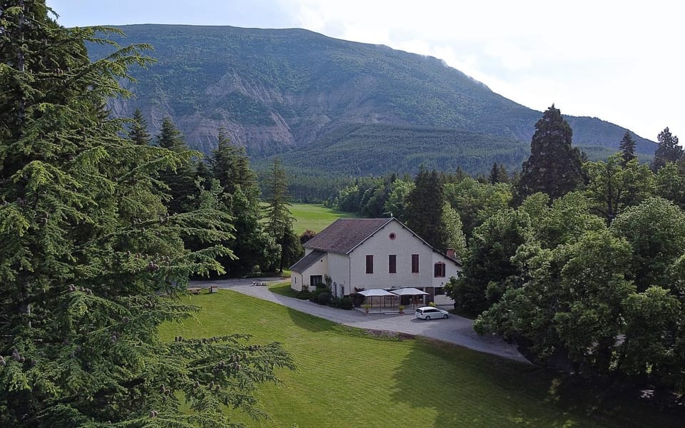 Property building, Nearby landmark, Natural landscape, Mountain view