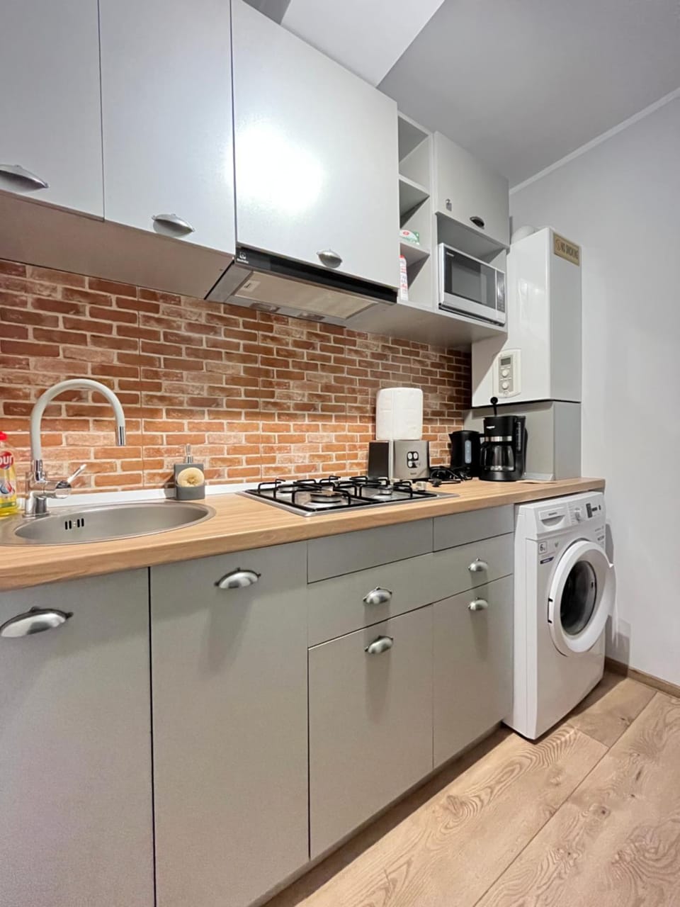 Coffee/tea facilities, Kitchen or kitchenette, minibar, stove, toaster, washing machine