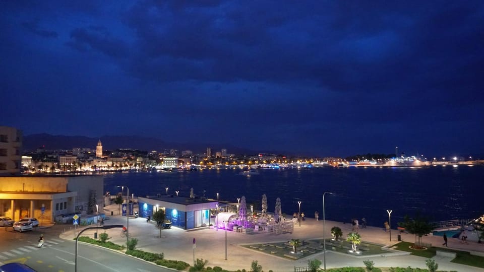 Property building, Nearby landmark, Restaurant/places to eat, Night, People, People, People, Neighbourhood, Natural landscape, Activities, Bird's eye view, View (from property/room), View (from property/room), Balcony/Terrace, Balcony/Terrace, Other, Other, Other, Photo of the whole room, Logo/Certificate/Sign, Logo/Certificate/Sign, Logo/Certificate/Sign, Autumn, On site, Text overlay, Text overlay, Text overlay, Guests, Guests, Guests, City view, City view, Landmark view, Landmark view, Mountain view, Mountain view, Sea view, Sea view, Street view, Street view, Area and facilities, Supermarket/grocery shop, Shopping Area, Seasons, Time of day, Location, children, children, children, young children, older children, Family, Family