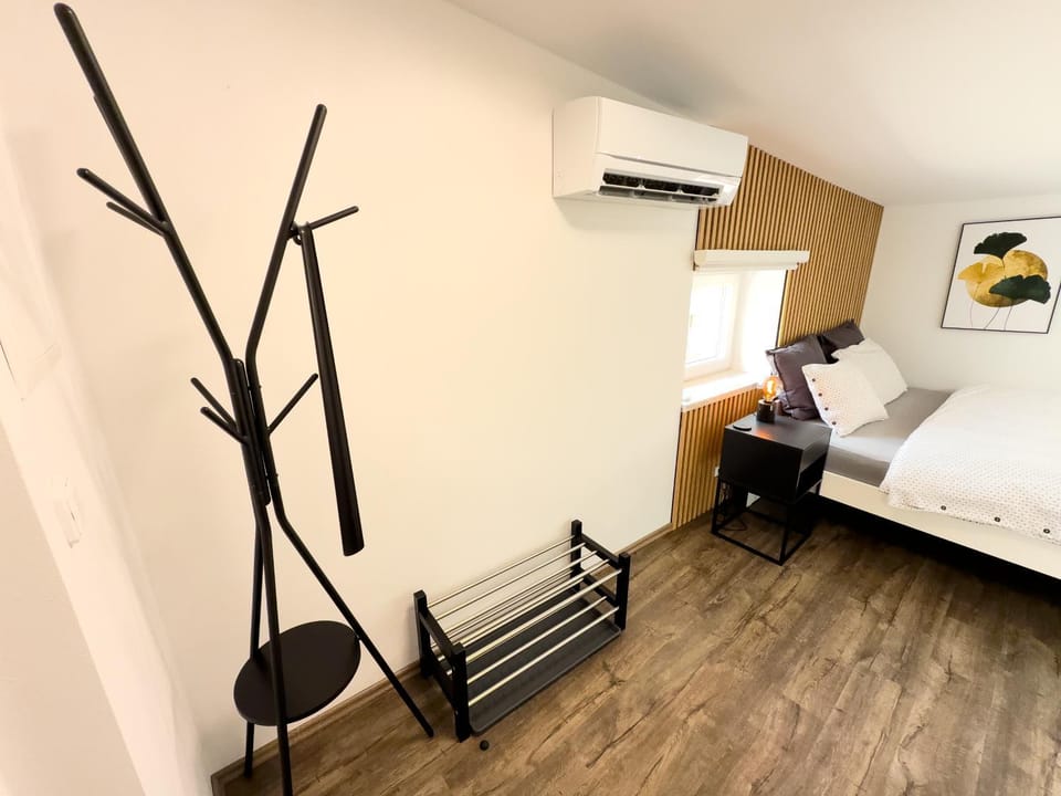 Bed, air conditioner