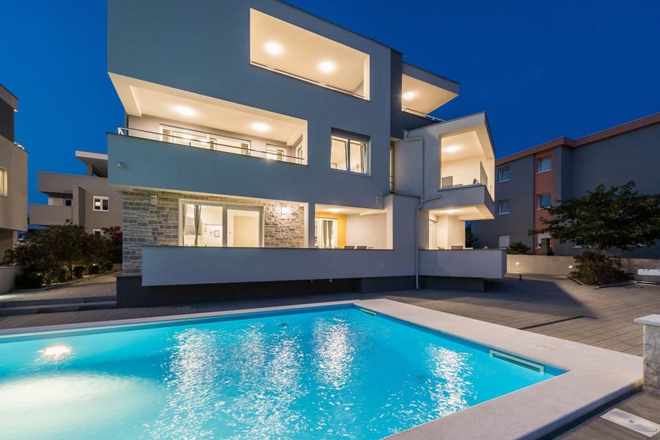 Property building, Swimming pool, Swimming pool, Sunset