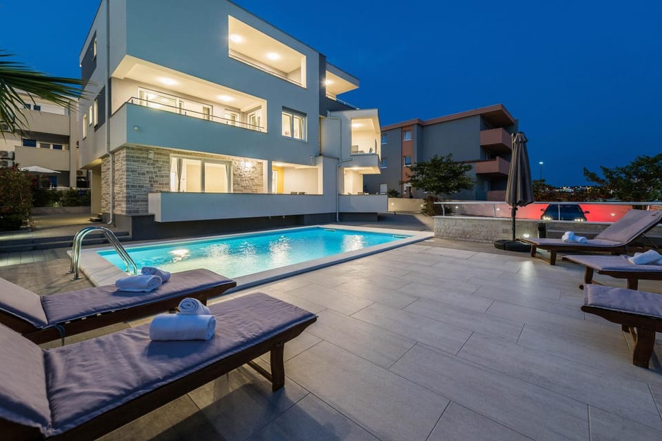 Property building, Swimming pool, Swimming pool, Sunset